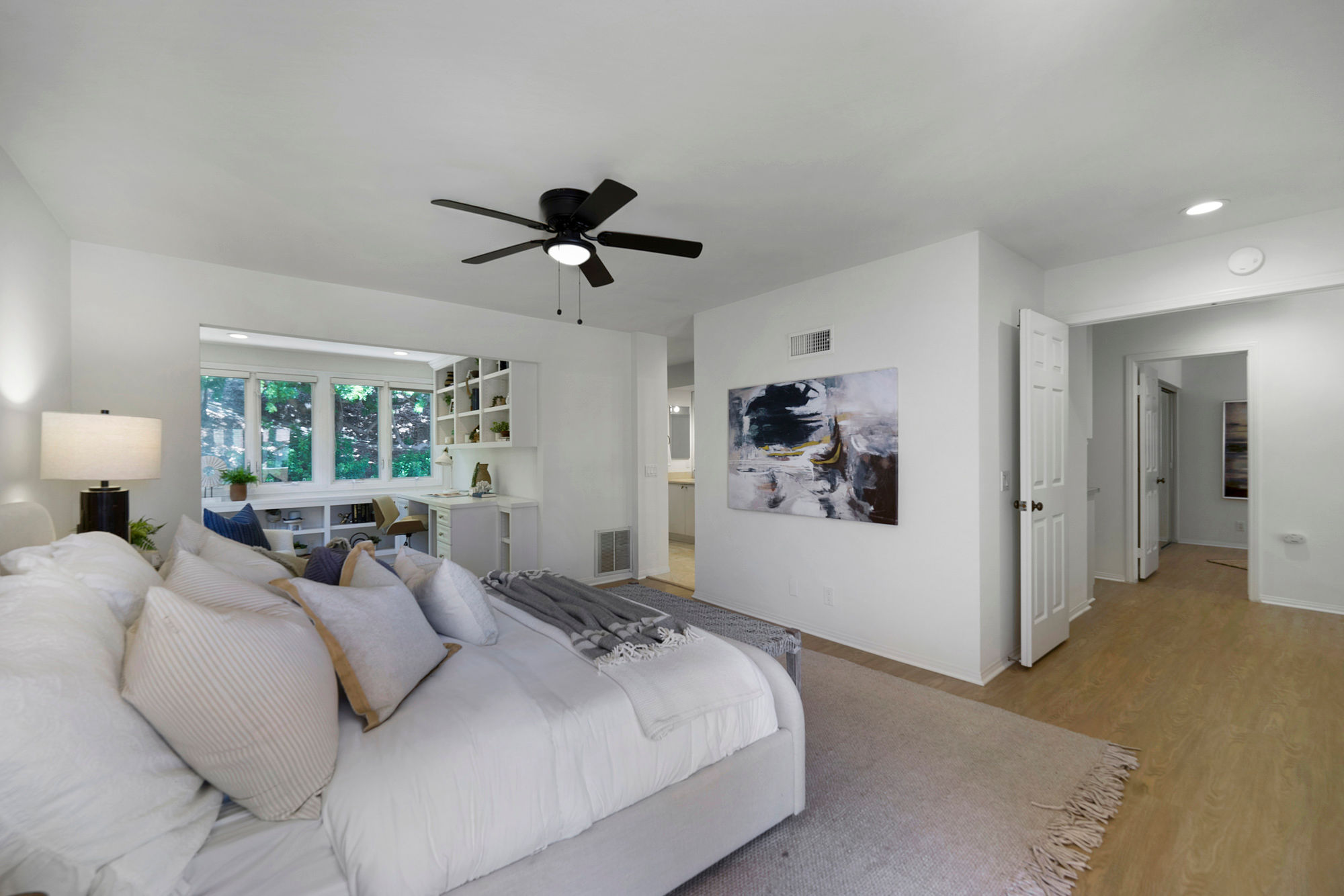 Del Mar staged primary bedroom neutral tones coastal