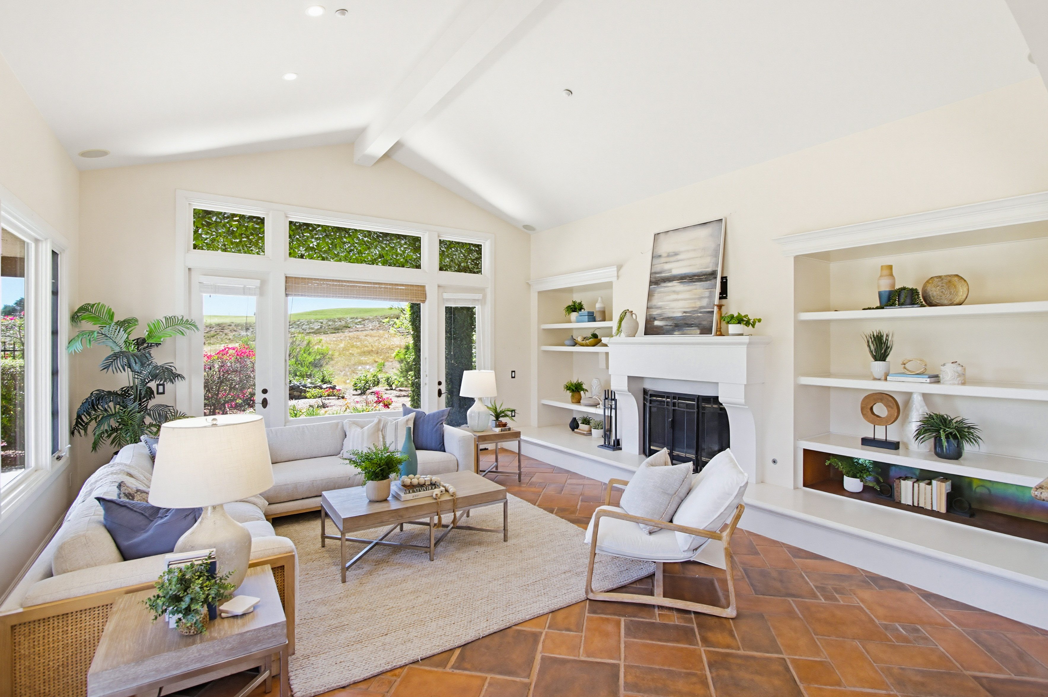 Staged living room built-ins golf course view Santaluz