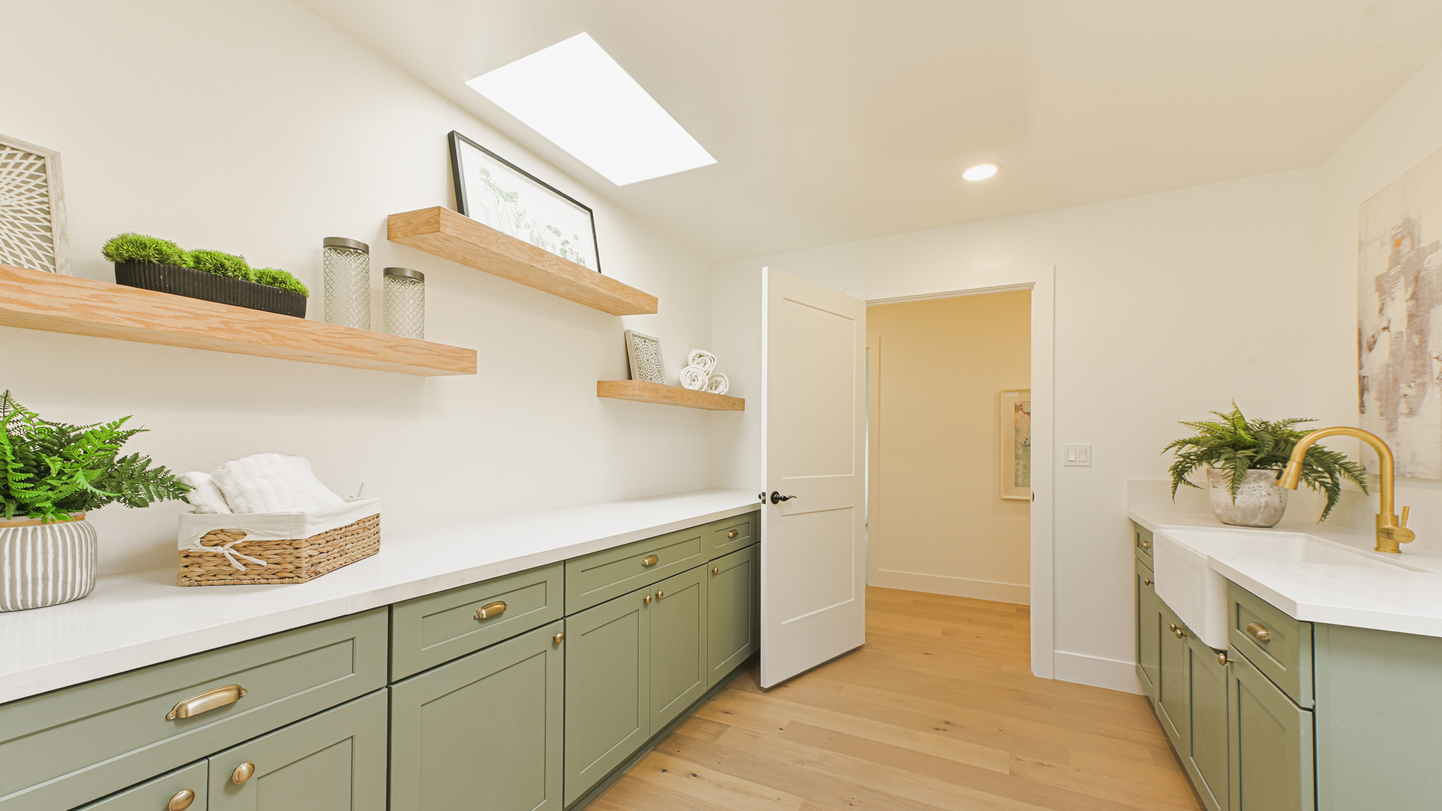 Staged laundry utility room San Diego Via Rancho